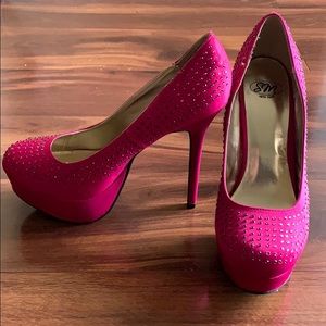 Hot pink platform rhinestone pumps